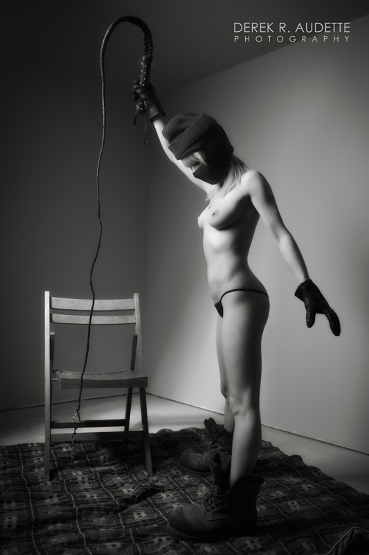 Woman with Whip and Chair - Photography by Derek R. Audette